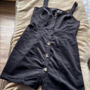 Black sleeveless corduroy dress